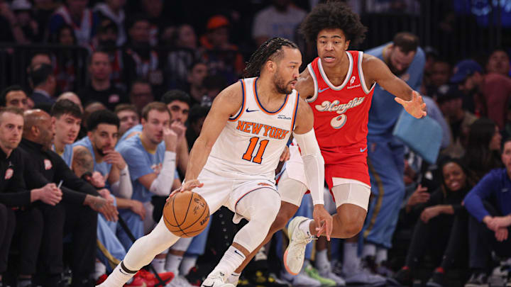 Jan 27, 2025; New York, New York, USA; New York Knicks guard Jalen Brunson (11) is guarded by Memphis Grizzlies forward Jaylen Wells (0) during the first half at Madison Square Garden. Mandatory Credit: Vincent Carchietta-Imagn Images