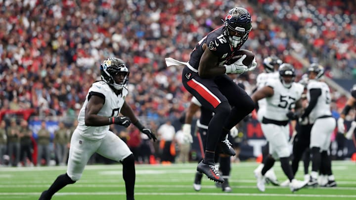 Nico Collins hauls in one of his 7 receptions in a 36-29 win over the Jacksonville Jaguars last Sunday