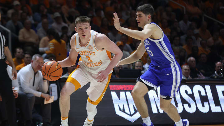 Mar 9, 2024; Knoxville, Tennessee, USA; Tennessee Volunteers guard Dalton Knecht (3) moves the ball against Kentucky Wildcats guard Reed Sheppard (15) during the second half at Thompson-Boling Arena at Food City Center. Mandatory Credit: Randy Sartin-USA TODAY Sports Mar 9, 2024; Knoxville, Tennessee, USA; Tennessee Volunteers guard Dalton Knecht (3) moves the ball against Kentucky Wildcats guard Reed Sheppard (15) during the second half at Thompson-Boling Arena at Food City Center. Mandatory Credit: Randy Sartin-USA TODAY Sports