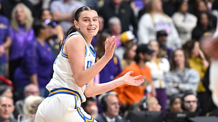 Mar 30, 2025; Spokane, WA, USA; UCLA Bruins guard Gabriela Jaquez (11) celebrates after a three-pointer against the LSU Lady Tigers during the second half of a Elite 8 NCAA Tournament basketball game at Spokane Arena. Mandatory Credit: James Snook-Imagn Images