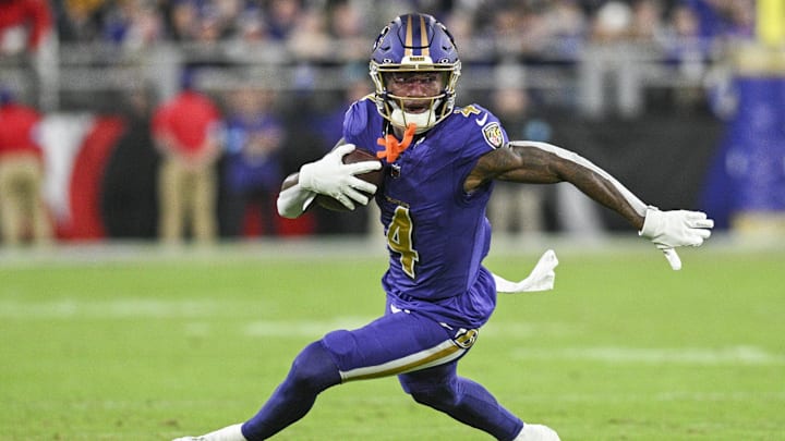 Nov 7, 2024; Baltimore, Maryland, USA; Baltimore Ravens wide receiver Zay Flowers (4) runs after a second quarter catch against the Cincinnati Bengals at M&T Bank Stadium. Mandatory Credit: Tommy Gilligan-Imagn Images