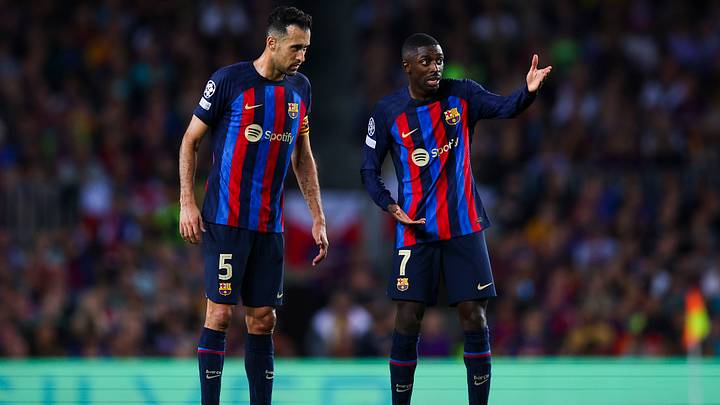 Sergi Busquets y Ousmane Dembélé