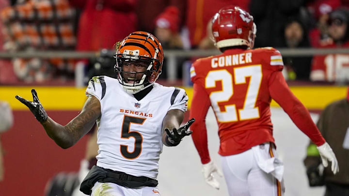 Dec 31, 2023; Kansas City, Missouri, USA; Cincinnati Bengals wide receiver Tee Higgins (5) reacts after a play against the Kansas City Chiefs during the second half at GEHA Field at Arrowhead Stadium. Mandatory Credit: Jay Biggerstaff-Imagn Images