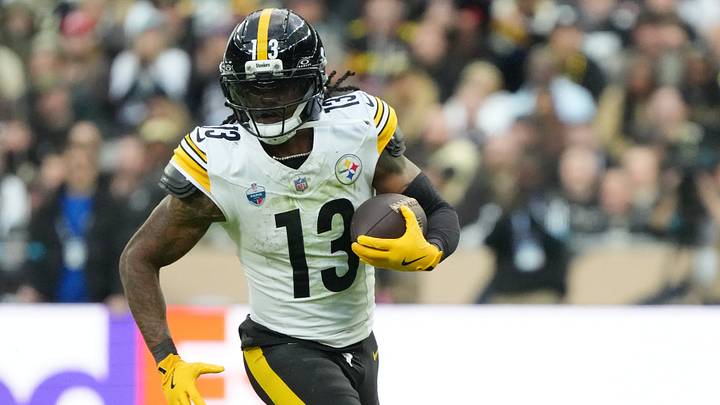 Pittsburgh Steelers running back Rico Dowdle (13) catches a pass  during the third quarter against the New Orleans Saints at Stade de France.  Mandatory Credit: Kirby Lee-Imagn Images
