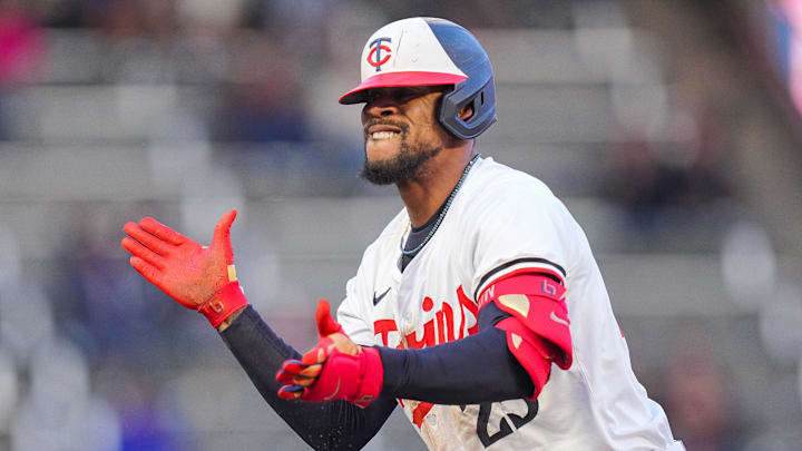May 28, 2024; Minneapolis, Minnesota, USA; Minnesota Twins outfielder Byron Buxton (25) celebrates his steal against the Kansas City Royals in the fifth inning at Target Field.