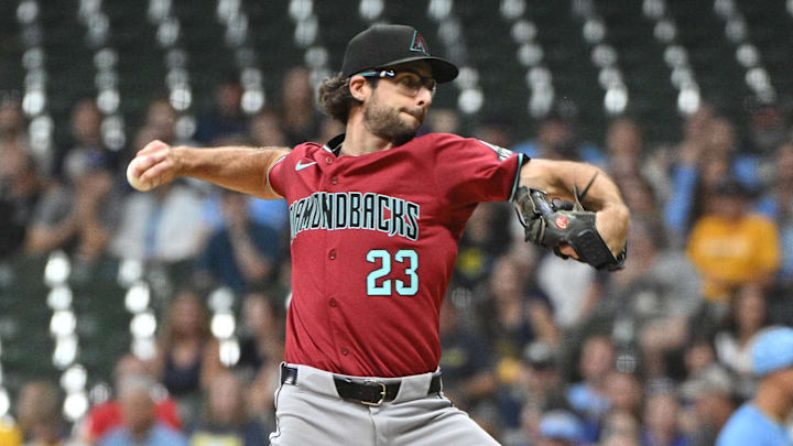 Sep 20, 2024; Milwaukee, Wisconsin, USA; Arizona Diamondbacks pitcher Zac Gallen (23) delivers a pitch against the Milwaukee Brewers in the first inning  at American Family Field. Mandatory Credit: Michael McLoone-Imagn Images