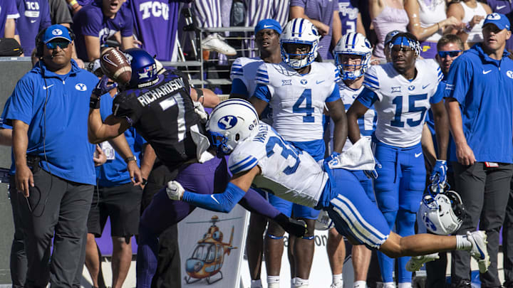 Oct 14, 2023; Fort Worth, Texas, USA; TCU Horned Frogs wide receiver JP Richardson (7) attempts but cannot catch a pass as Brigham Young Cougars safety Crew Wakley (38) defends during the game at Amon G. Carter Stadium.