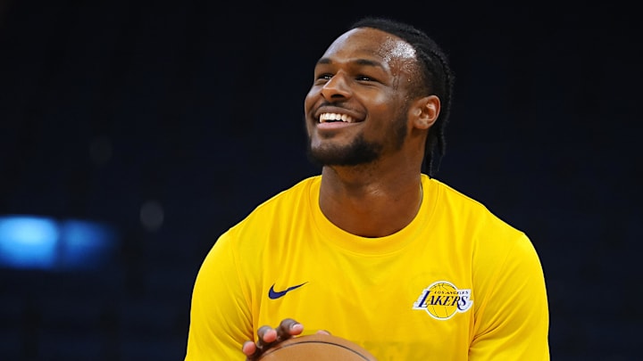 Jul 10, 2024; San Francisco, CA, USA; Los Angeles Lakers guard Bronny James Jr. (9) smiles during warm ups before a game against the Miami Heat at Chase Center. Mandatory Credit: Kelley L Cox-Imagn Images Jul 10, 2024; San Francisco, CA, USA; Los Angeles Lakers guard Bronny James Jr. (9) smiles during warm ups before a game against the Miami Heat at Chase Center. Mandatory Credit: Kelley L Cox-Imagn Images