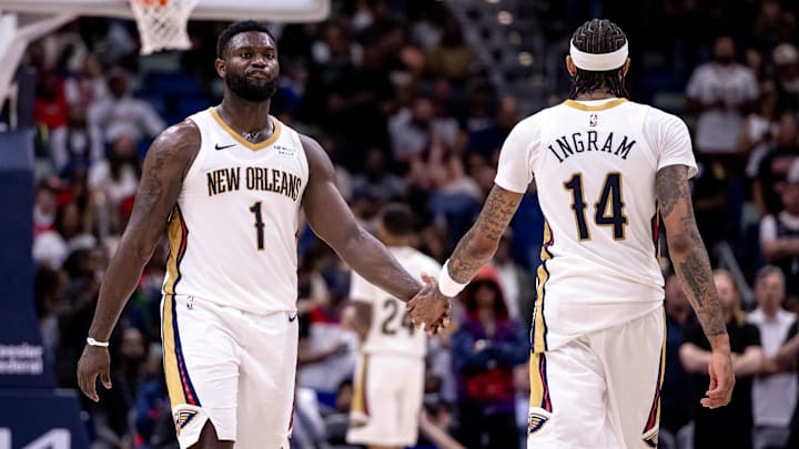 Nov 1, 2024; New Orleans, Louisiana, USA; New Orleans Pelicans forward Brandon Ingram (14) slaps hands with forward Zion Williamson (1) after a play against the Indiana Pacers during the second half at Smoothie King Center. Mandatory Credit: Stephen Lew-Imagn Images Nov 1, 2024; New Orleans, Louisiana, USA; New Orleans Pelicans forward Brandon Ingram (14) slaps hands with forward Zion Williamson (1) after a play against the Indiana Pacers during the second half at Smoothie King Center. Mandatory Credit: Stephen Lew-Imagn Images