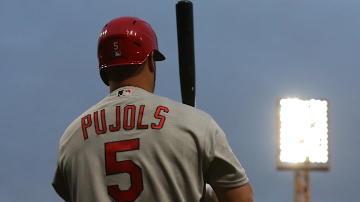 Oct 3, 2022; Pittsburgh, Pennsylvania, USA;  St. Louis Cardinals designated hitter Albert Pujols (5) in the on-deck circle against the Pittsburgh Pirates during the first inning at PNC Park. Mandatory Credit: Charles LeClaire-Imagn Images