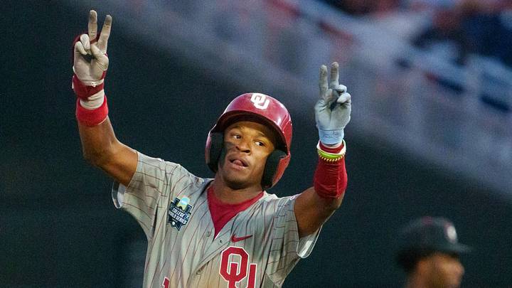 Oklahoma Sooners center fielder Jason Walk (1) celebrates after hitting a home run against the Georgia Bulldogs. Oklahoma Sooners center fielder Jason Walk (1) celebrates after hitting a home run against the Georgia Bulldogs.