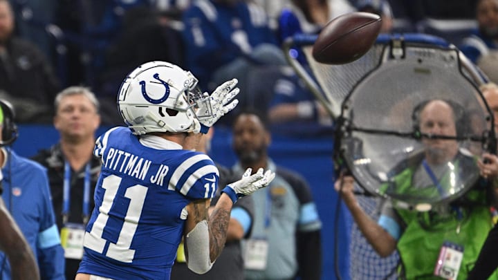 Jan 5, 2025; Indianapolis, Indiana, USA; Indianapolis Colts wide receiver Michael Pittman Jr. (11) catches a pass during the second quarter against the Jacksonville Jaguars at Lucas Oil Stadium. 