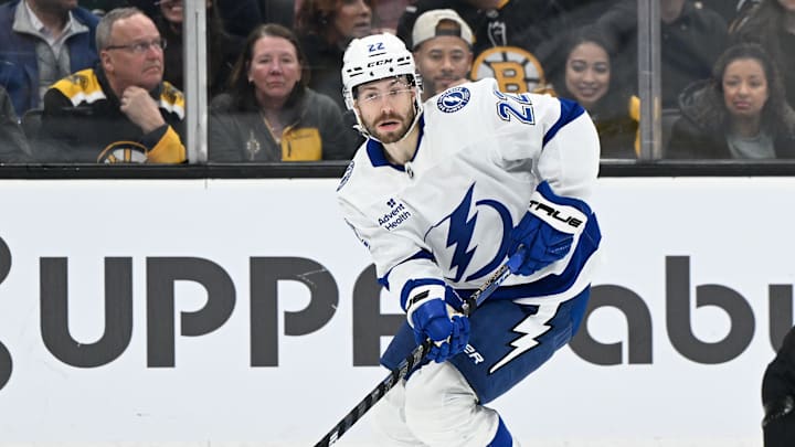 Mar 15, 2025; Boston, Massachusetts, USA; Tampa Bay Lightning right wing Oliver Bjorkstrand (22) skates with the puck during the second period against the Boston Bruins at TD Garden. Mandatory Credit: Eric Canha-Imagn Images