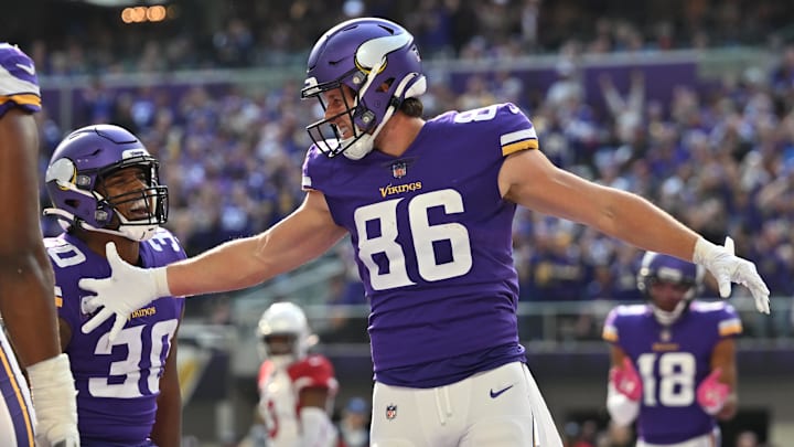 Oct 30, 2022; Minneapolis, Minnesota, USA; Minnesota Vikings tight end Johnny Mundt (86) reacts with fullback C.J. Ham (30) after scoring a touchdown against the Arizona Cardinals during the second first at U.S. Bank Stadium. Mandatory Credit: Jeffrey Becker-Imagn Images