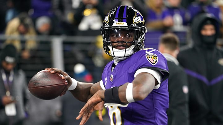 Jan 11, 2025; Baltimore, Maryland, USA; Baltimore Ravens quarterback Lamar Jackson (8) warms up before an AFC wild card game against the Pittsburgh Steelers at M&T Bank Stadium. Mandatory Credit: Mitch Stringer-Imagn Images