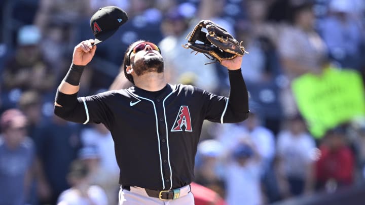 Jul 7, 2024; San Diego, California, USA; Arizona Diamondbacks third baseman Eugenio Suarez (28) celebrates on the field after defeating the San Diego Padres at Petco Park. Mandatory Credit: Orlando Ramirez-USA TODAY Sports