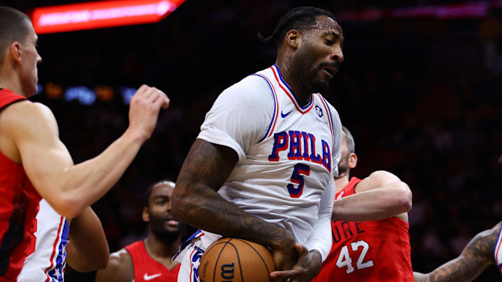 Nov 18, 2024; Miami, Florida, USA; Philadelphia 76ers center Andre Drummond (5) grabs a rebound against the Miami Heat during the third quarter at Kaseya Center. Mandatory Credit: Sam Navarro-Imagn Images Nov 18, 2024; Miami, Florida, USA; Philadelphia 76ers center Andre Drummond (5) grabs a rebound against the Miami Heat during the third quarter at Kaseya Center. Mandatory Credit: Sam Navarro-Imagn Images