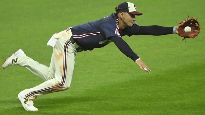 Sep 18, 2024; Cleveland, Ohio, USA; Cleveland Guardians second baseman Andres Gimenez (0) fields a ground ball in the fifth inning against the Minnesota Twins at Progressive Field. Mandatory Credit: David Richard-Imagn Images
