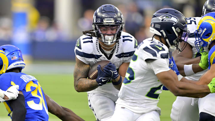Jan 5, 2025; Inglewood, California, USA; Seattle Seahawks wide receiver Jaxon Smith-Njigba (11) runs the ball in the first half against the Los Angeles Rams at SoFi Stadium. Jan 5, 2025; Inglewood, California, USA; Seattle Seahawks wide receiver Jaxon Smith-Njigba (11) runs the ball in the first half against the Los Angeles Rams at SoFi Stadium.
