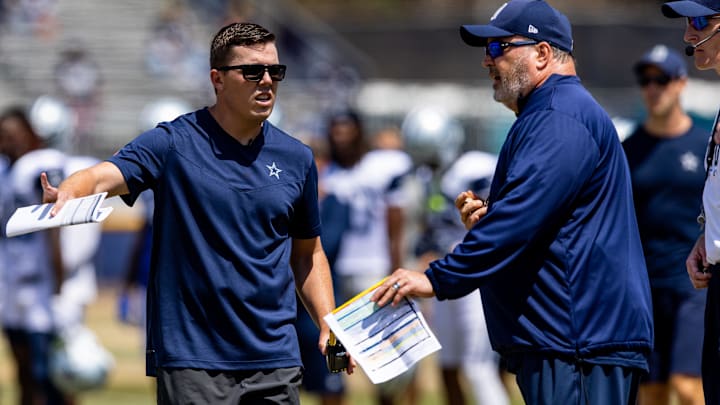 Aug 4, 2022; Oxnard, CA, USA; Dallas Cowboys offensive coordinator Kellen Moore (left) and head