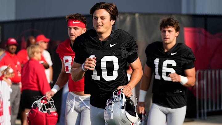 Ohio State Buckeyes quarterback Julian Sayin (10) takes the field for football training camp at the Woody Hayes Athletic Center on Aug. 1, 2025.