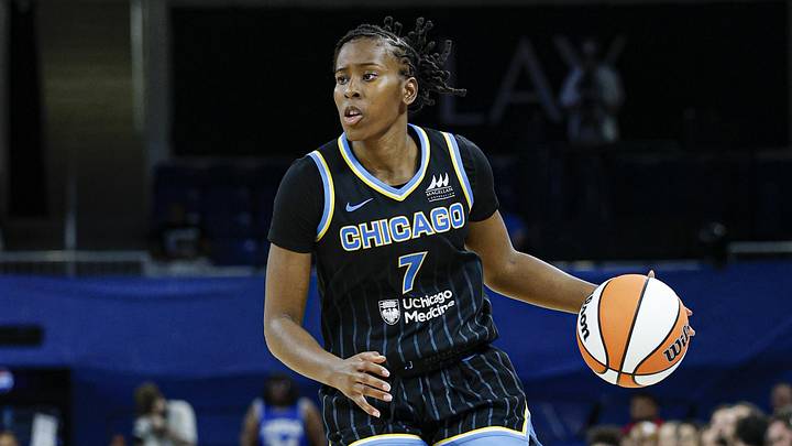 Jul 12, 2025; Chicago, Illinois, USA; Chicago Sky guard Ariel Atkins (7) brings the ball up court against the Minnesota Lynx during the second half of a WNBA game at Wintrust Arena. Mandatory Credit: Kamil Krzaczynski-Imagn Images