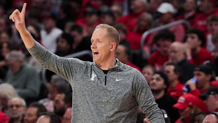 Mar 3, 2026; Cincinnati, Ohio, USA; BYU Cougars head coach Kevin Young works the sideline against the Cincinnati Bearcats in the first half at Fifth Third Arena. Mar 3, 2026; Cincinnati, Ohio, USA; BYU Cougars head coach Kevin Young works the sideline against the Cincinnati Bearcats in the first half at Fifth Third Arena.