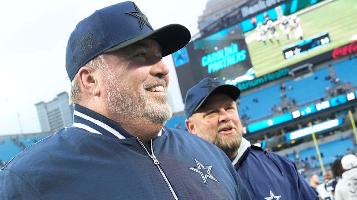 Dallas Cowboys head coach Mike McCarthy walks off the field after the game at Bank of America Stadium. 