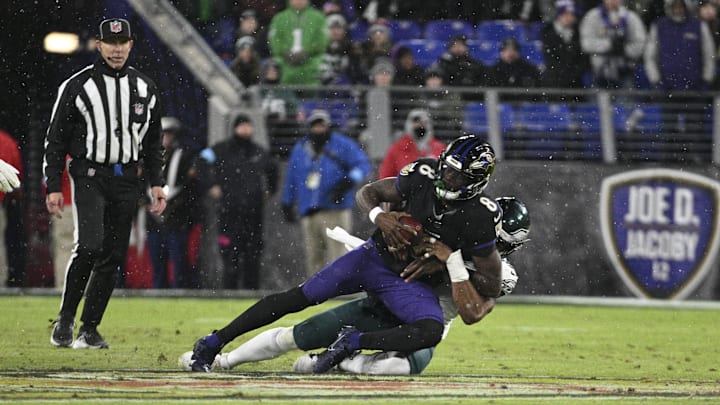 Philadelphia Eagles linebacker Nolan Smith Jr. (3) sacks Baltimore Ravens quarterback Lamar Jackson (8) during the first half at M&T Bank Stadium. 