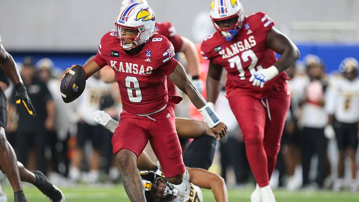 Kansas Jayhawks quarterback Isaiah Marshall (8) runs the ball against Missouri Tigers during the game inside David Booth Kansas Memorial Stadium on Sept. 11, 2026. Kansas Jayhawks quarterback Isaiah Marshall (8) runs the ball against Missouri Tigers during the game inside David Booth Kansas Memorial Stadium on Sept. 11, 2026.