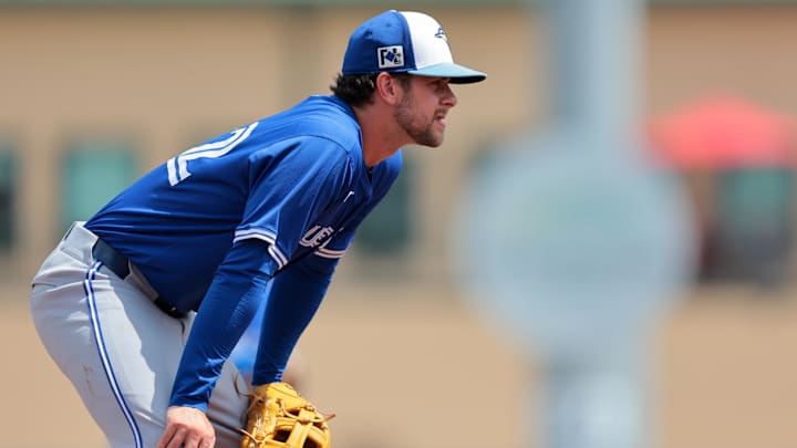 Mar 15, 2025: Toronto Blue Jays third baseman Ernie Clement (22) looks on against the St. Louis Cardinals during the second inning at Roger Dean Chevrolet Stadium. 