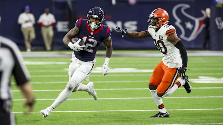 Jan 13, 2024; Houston, Texas, USA; Houston Texans wide receiver Nico Collins (12) runs with the ball