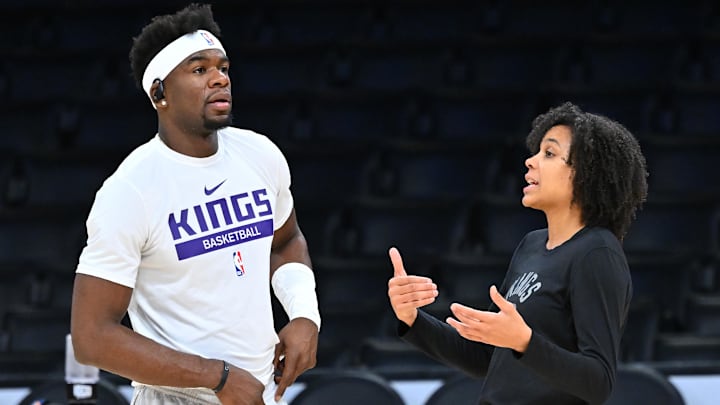 Nov 11, 2022; Los Angeles, California, USA; Sacramento Kings guard Terence Davis (3) talks with assistant coach Lindsey Harding prior to the game against the Los Angeles Lakers at Crypto.com Arena. Mandatory Credit: Jayne Kamin-Oncea-Imagn Images