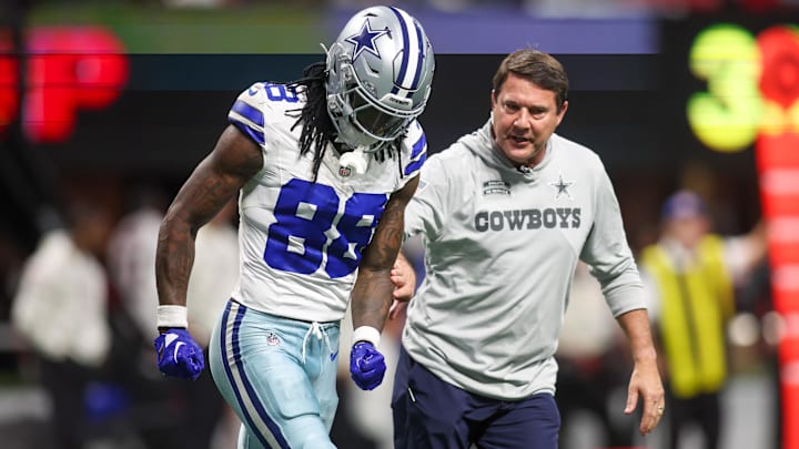 Dallas Cowboys wide receiver CeeDee Lamb leaves the game with an injury against the Atlanta Falcons in the fourth quarter at Mercedes-Benz Stadium.