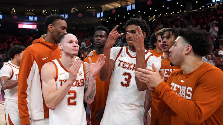 Texas Longhorns guard Chendall Weaver and guard Dailyn Swain celebrate a win against the Vanderbilt Commodores during the second half at Moody Center. 