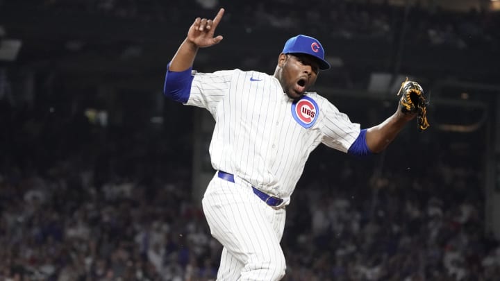 Jun 4, 2024; Chicago, Illinois, USA; Chicago Cubs pitcher Hector Neris (51) reacts after the final out against the Chicago White Sox during the eighth inning at Wrigley Field.
