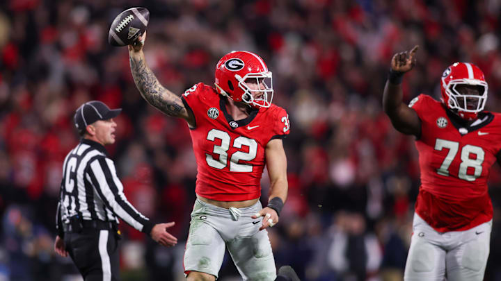 Nov 29, 2024; Athens, Georgia, USA; Georgia Bulldogs linebacker Chaz Chambliss (32) reacts after recovering a fumble against the Georgia Tech Yellow Jackets in the fourth quarter at Sanford Stadium. Mandatory Credit: Brett Davis-Imagn Images