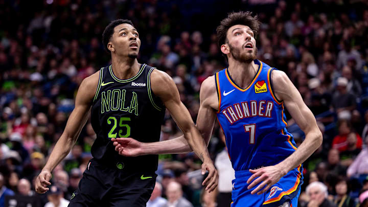 New Orleans Pelicans guard Trey Murphy III (25) and Oklahoma City Thunder forward Chet Holmgren (7) go for rebounds during game four of the first round for the 2024 NBA playoffs at Smoothie King Center. Mandatory Credit: Stephen Lew-Imagn Images