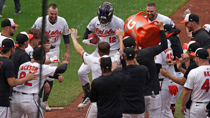 Sep 25, 2025; Baltimore, Maryland, USA; Baltimore Orioles outfielder Dylan Beavers (12) celebrates after hitting a game winning solo home run in the ninth inning against the Tampa Bay Rays at Oriole Park at Camden Yards. Mandatory Credit: Mitch Stringer-Imagn Images