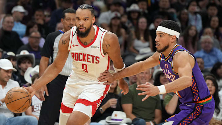 Mar 30, 2025; Phoenix, Arizona, USA; Houston Rockets forward Dillon Brooks (9) drives past Phoenix Suns guard Devin Booker (1) in the first half at Footprint Center. Mandatory Credit: Rick Scuteri-Imagn Images Mar 30, 2025; Phoenix, Arizona, USA; Houston Rockets forward Dillon Brooks (9) drives past Phoenix Suns guard Devin Booker (1) in the first half at Footprint Center. Mandatory Credit: Rick Scuteri-Imagn Images