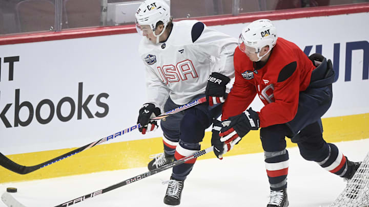 Team USA's Brady Tkachuk and Charlie McAvoy (white) during training for the 4 Nations Face-Off. Team USA's Brady Tkachuk and Charlie McAvoy (white) during training for the 4 Nations Face-Off.