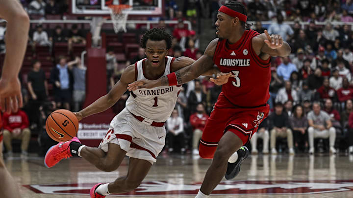 Jan 2, 2025; Stanford, California, USA; Stanford Cardinal guard Ebuka Okorie (1) dribbles against Louisville Cardinals guard Ryan Conwell (3) during the second half at Maples Pavilion. Mandatory Credit: Justine Willard-Imagn Images Jan 2, 2025; Stanford, California, USA; Stanford Cardinal guard Ebuka Okorie (1) dribbles against Louisville Cardinals guard Ryan Conwell (3) during the second half at Maples Pavilion. Mandatory Credit: Justine Willard-Imagn Images
