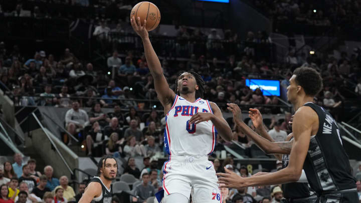 Apr 7, 2024; San Antonio, Texas, USA;  Philadelphia 76ers guard Tyrese Maxey (0) shoots in front of