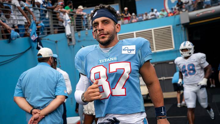 Tennessee Titans wide receiver Xavier Restrepo (87) heads to the field during the Blue and White Stadium Scrimmage at Nissan Stadium in Nashville, Tenn., Friday, Aug. 7, 2026. Tennessee Titans wide receiver Xavier Restrepo (87) heads to the field during the Blue and White Stadium Scrimmage at Nissan Stadium in Nashville, Tenn., Friday, Aug. 7, 2026.