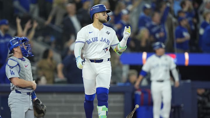 Nov 1, 2025; Toronto, Ontario, CAN; Toronto Blue Jays designated hitter Bo Bichette (11) reacts after hitting a three run home run against the Los Angeles Dodgers in the third inning during game seven of the 2025 MLB World Series at Rogers Centre. Mandatory Credit: John E. Sokolowski-Imagn Images Nov 1, 2025; Toronto, Ontario, CAN; Toronto Blue Jays designated hitter Bo Bichette (11) reacts after hitting a three run home run against the Los Angeles Dodgers in the third inning during game seven of the 2025 MLB World Series at Rogers Centre. Mandatory Credit: John E. Sokolowski-Imagn Images