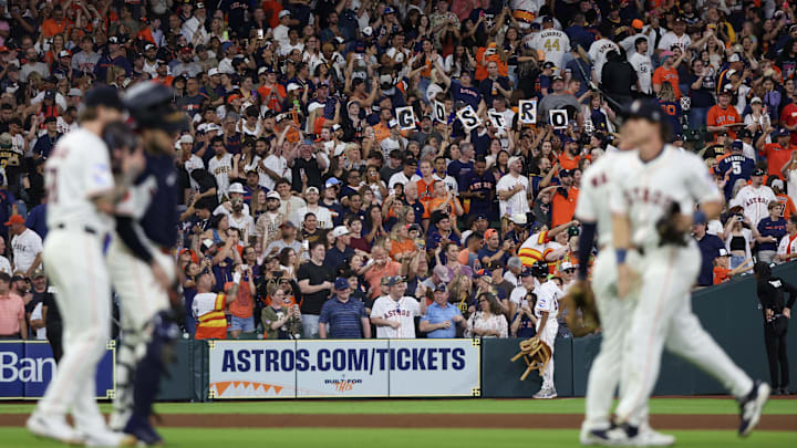 Apr 19, 2025; Houston, Texas, USA; Fans celebrate the Houston Astros win after defeating the San Diego Padres at Daikin Park.