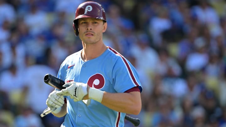 Philadelphia Phillies catcher J.T. Realmuto (10) reacts after striking out in the second inning against the Los Angeles Dodgers during game four of the NLDS round for the 2025 MLB playoffs at Dodger Stadium. 