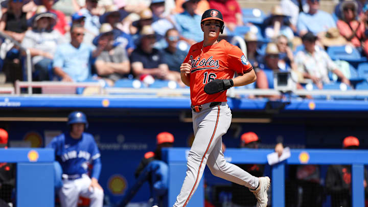 Dunedin, Florida, USA; Baltimore Orioles third baseman Coby Mayo (16) scores a run against the Toronto Blue Jays in the second inning during spring training at TD Ballpark. Dunedin, Florida, USA; Baltimore Orioles third baseman Coby Mayo (16) scores a run against the Toronto Blue Jays in the second inning during spring training at TD Ballpark.