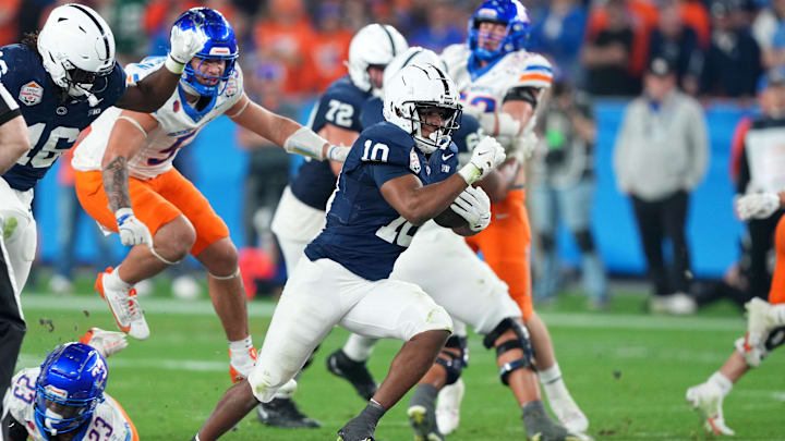 Penn State Nittany Lions running back Nicholas Singleton (10) rushes for a touchdown against the Boise State Broncos during the second half in the Fiesta Bowl at State Farm Stadium. 