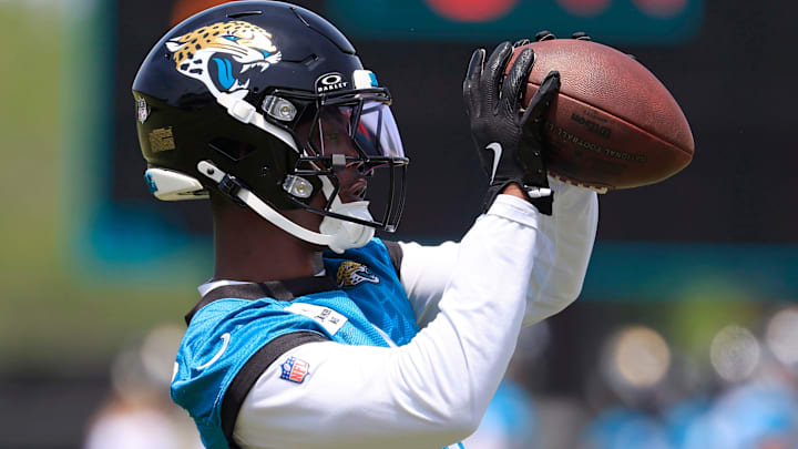 Jacksonville Jaguars running back Travis Etienne Jr. catches a pass during the first organized team activity at Miller Electric Center.